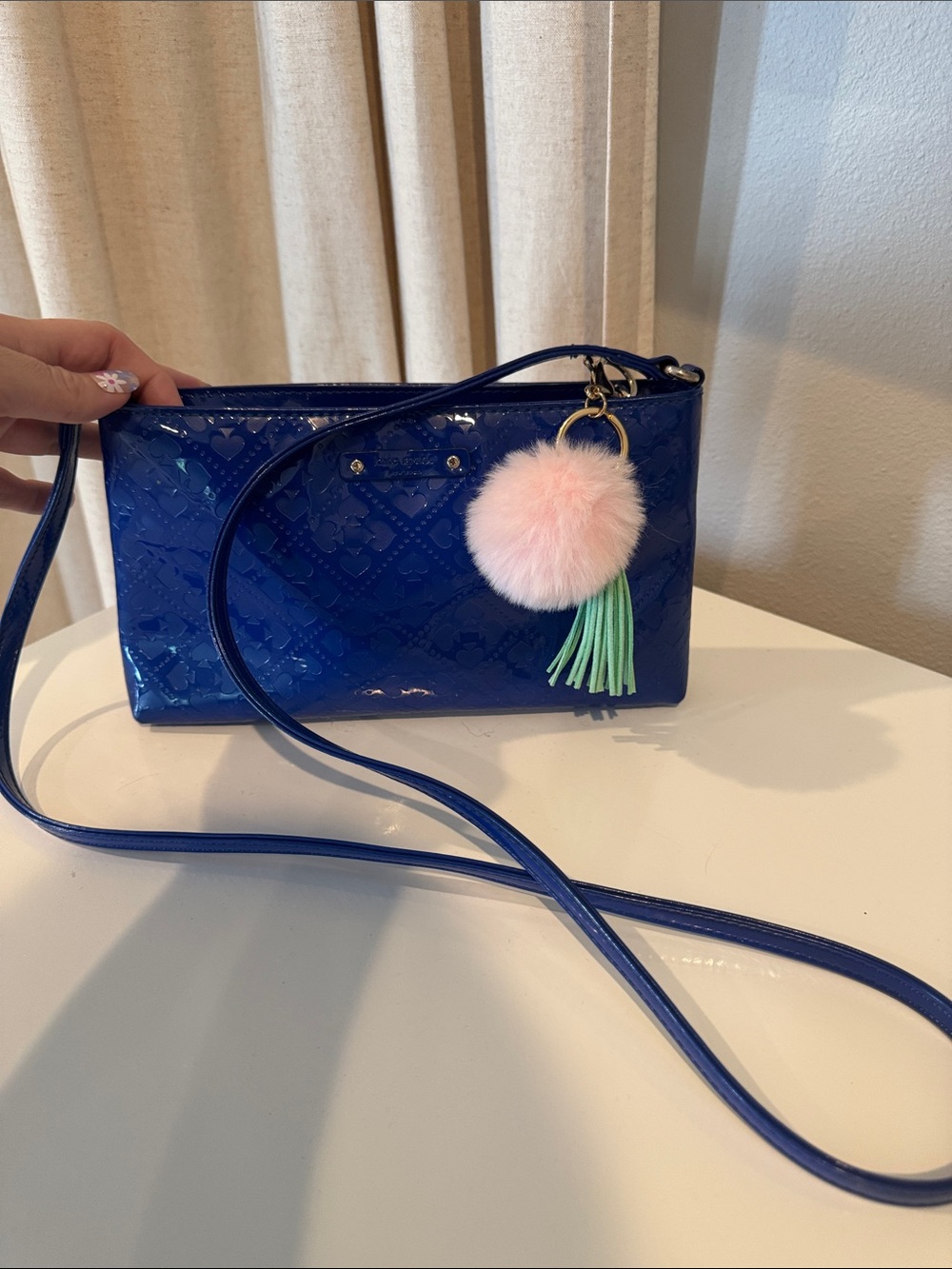 kate spade Blue Patent Crossbody with Pink Pom and Green Tassel